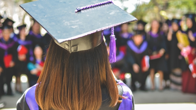 Dawning Dreams: The Symbolism of Graduation Caps and Gowns