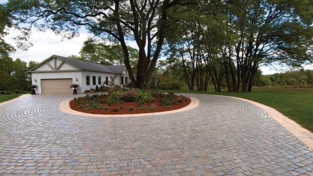 Stepping Stones to an Enchanting Outdoor Escape: Mastering Patio Pavers Installation